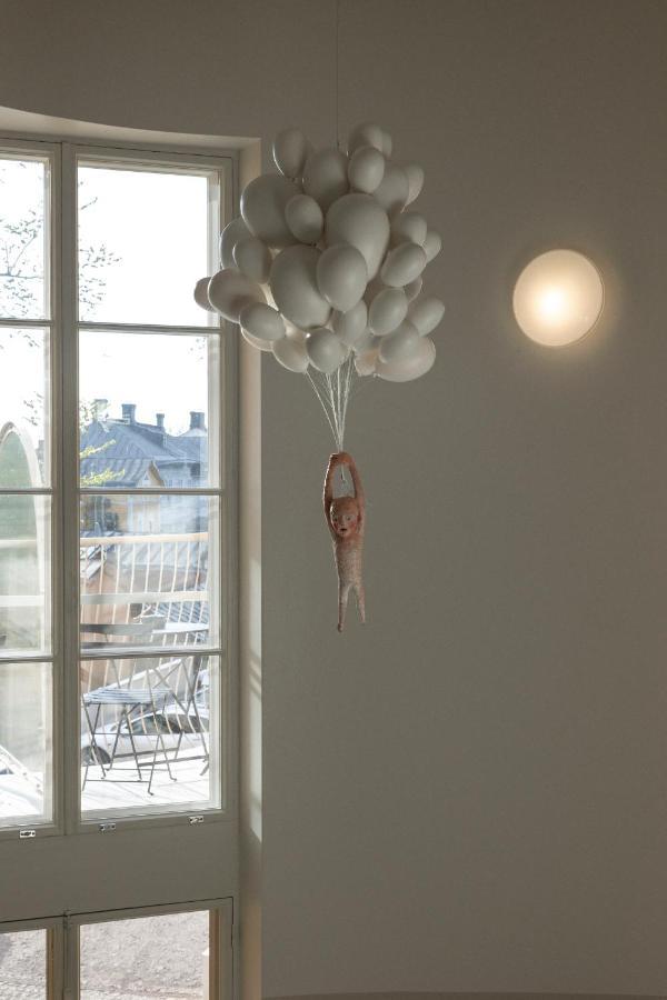 Runo Hotel Borgå Exteriör bild A balloon with a key attached